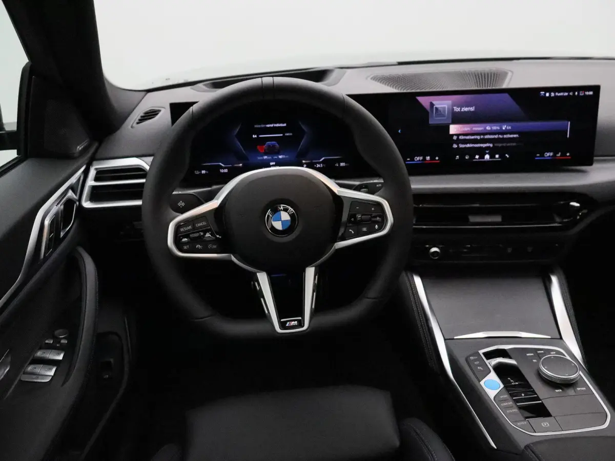 eDrive40 M Sport Edition | M Sportpakket Pro | SoH 100% | Innovation Pack | Comfort Pack | Schuifdak | Elektrisch Verstelbare M Sportstoelen | Active Cruise Control | Harman Kardon | 19''