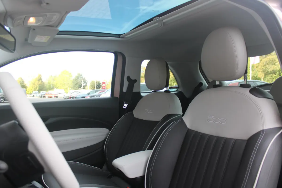 1.0 Hybrid La Prima | PANORAMADAK | DRAADLOZE APPLE CARPLAY/ANDROID AUTO | DRAADLOZE TELEFOONLADER | LEDER BEKLEDING | ACHTERUITRIJ CAMERA  | PARKEERSESOREN ACHTER | 17" LICHTMETALEN VELGEN 