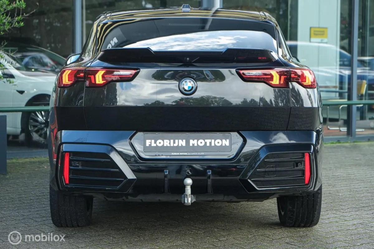 eDrive20 67 kWh | 100% SOH | M-Sportpakket | Harman Kardon | Pano | Trekhaak | ACC | Camera | M-Sportpakket Pro | Stoelverwarming | LED |