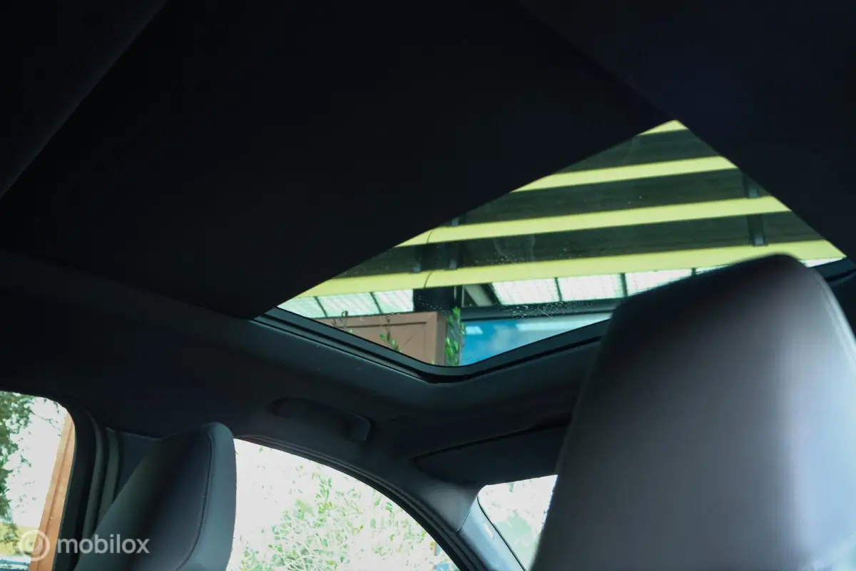eDrive20 67 kWh | 100% SOH | M-Sportpakket | Harman Kardon | Pano | Trekhaak | ACC | Camera | M-Sportpakket Pro | Stoelverwarming | LED |