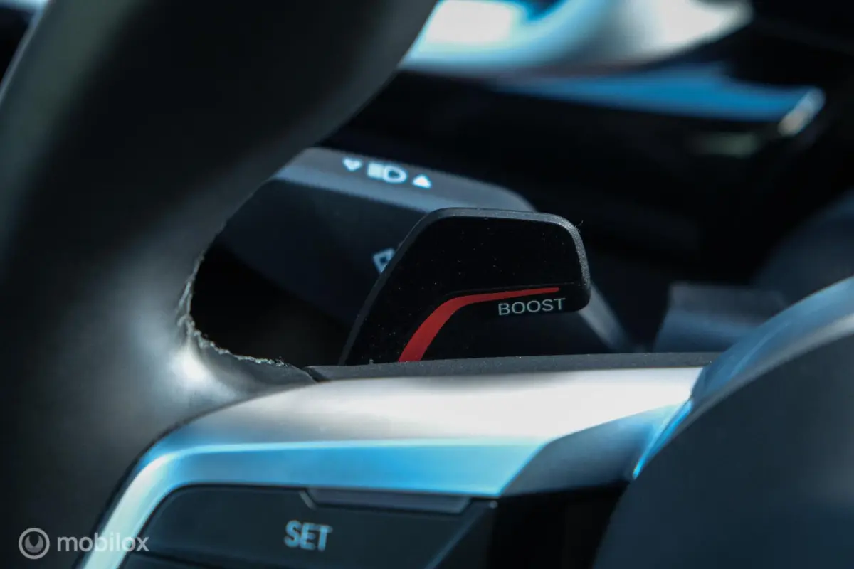 eDrive20 67 kWh | 100% SOH | M-Sportpakket | Harman Kardon | Pano | Trekhaak | ACC | Camera | M-Sportpakket Pro | Stoelverwarming | LED |