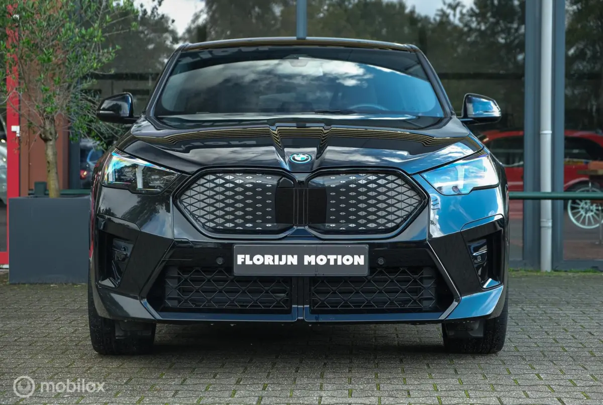 eDrive20 67 kWh | 100% SOH | M-Sportpakket | Harman Kardon | Pano | Trekhaak | ACC | Camera | M-Sportpakket Pro | Stoelverwarming | LED |
