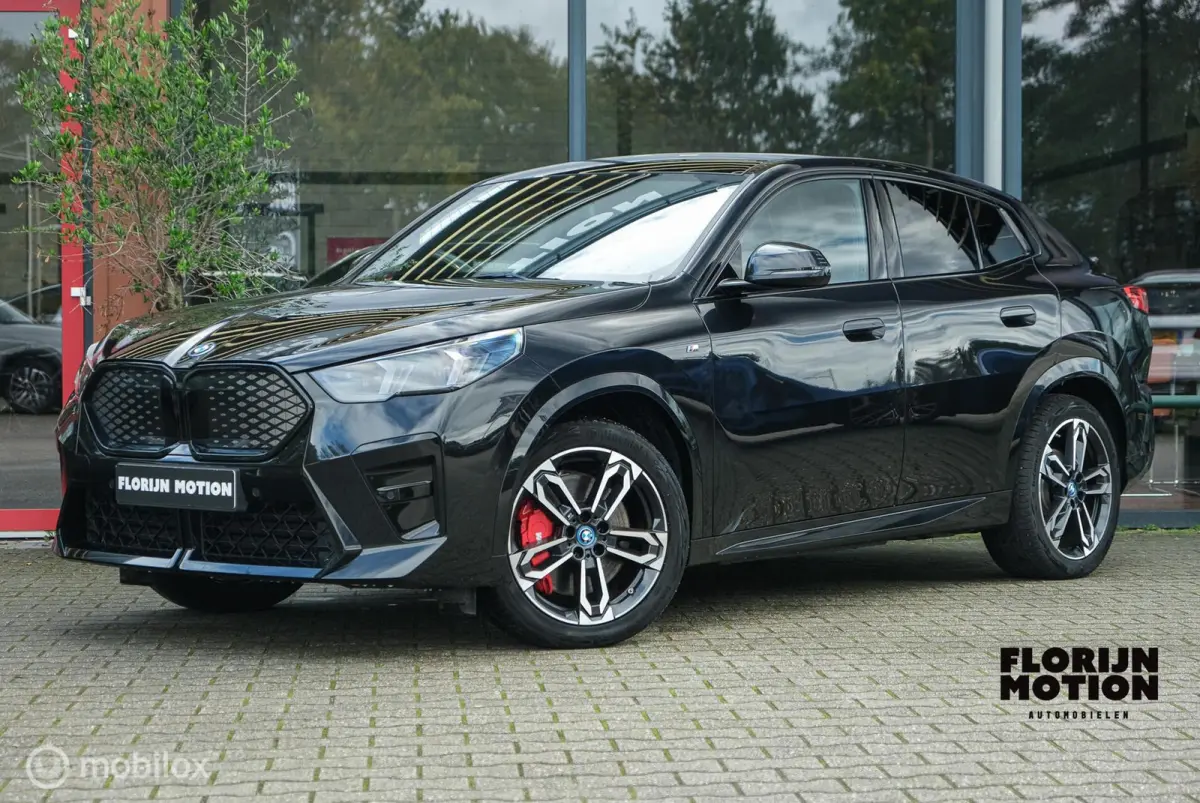 eDrive20 67 kWh | 100% SOH | M-Sportpakket | Harman Kardon | Pano | Trekhaak | ACC | Camera | M-Sportpakket Pro | Stoelverwarming | LED |