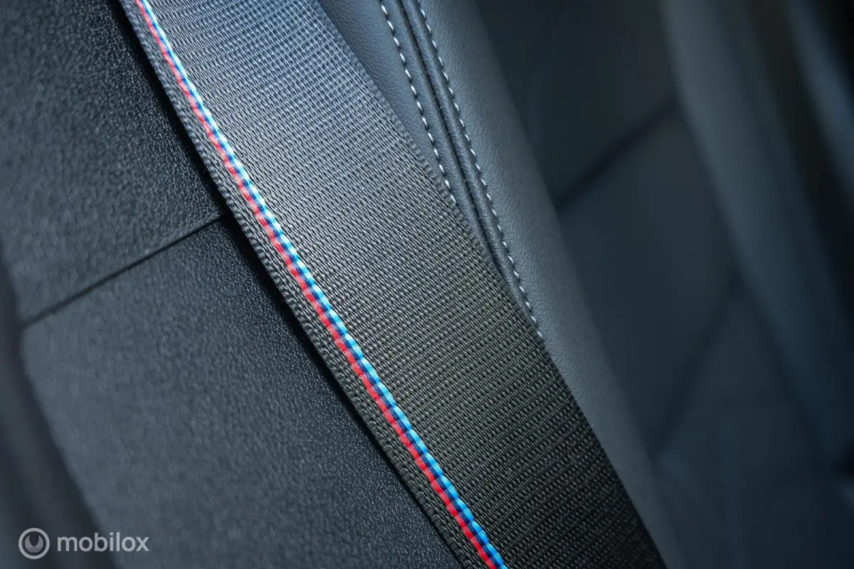 eDrive20 67 kWh | 100% SOH | M-Sportpakket | Harman Kardon | Pano | Trekhaak | ACC | Camera | M-Sportpakket Pro | Stoelverwarming | LED |