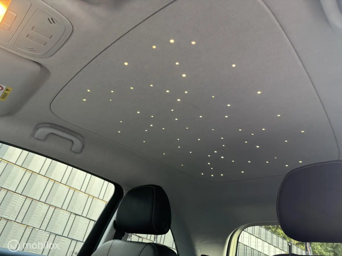1.0 Turbo Unlimited CarPlay Sterrenhemel Stoelverw