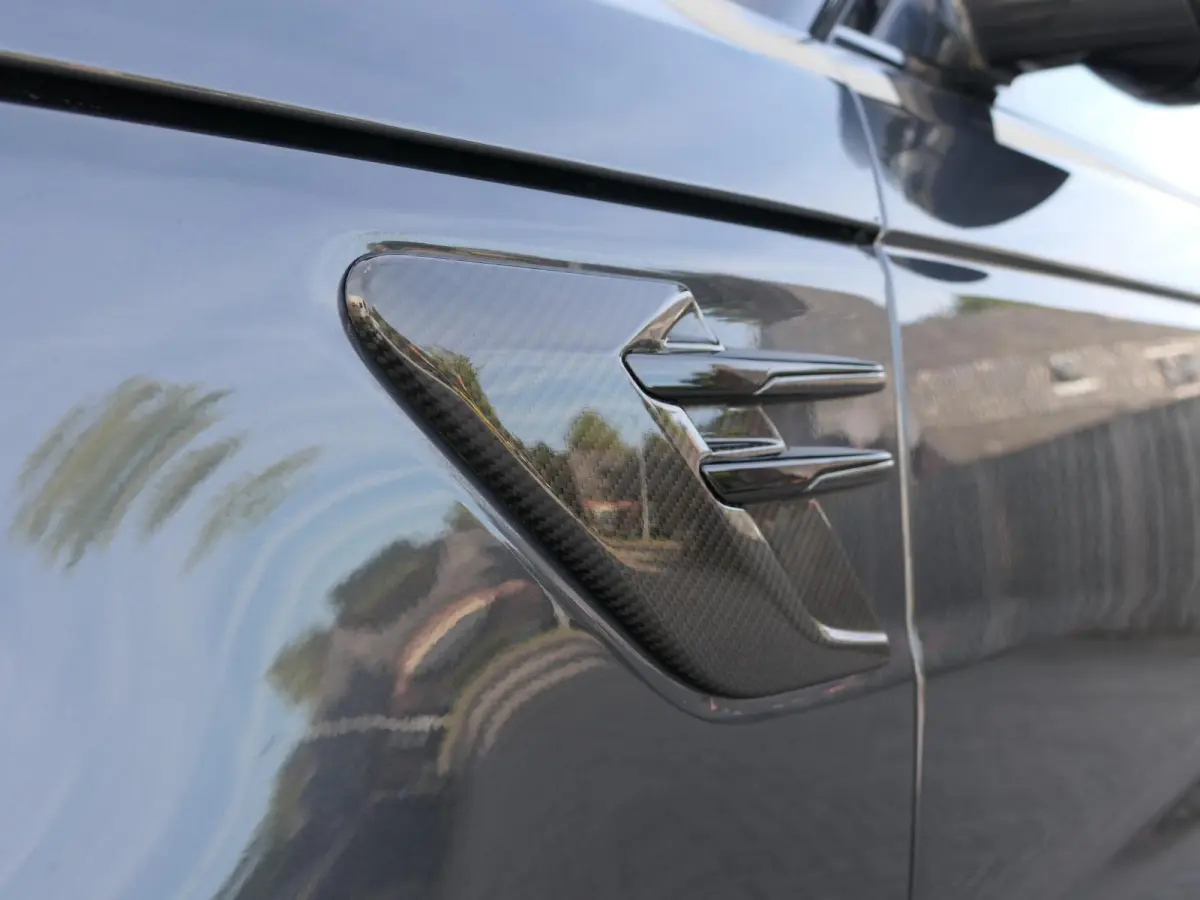 3.0 P400 HST | Carbon | Alcantara hemel | Meridian | Panoramadak | Head-up display | Adapative Cruise Control | Dodehoek ​detectie | Trekhaak | Luchtvering | Apple-/Android Carplay | Stoel