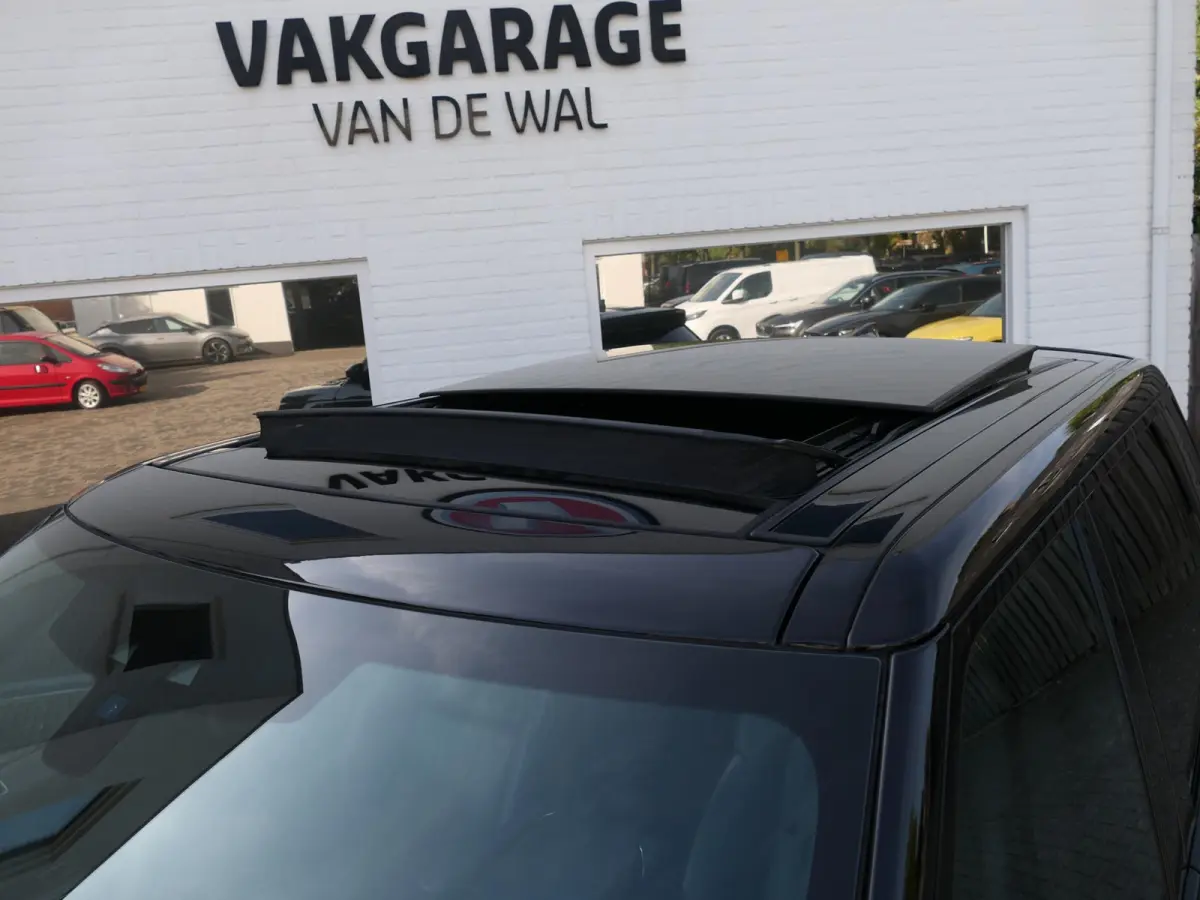 3.0 P400 HST | Carbon | Alcantara hemel | Meridian | Panoramadak | Head-up display | Adapative Cruise Control | Dodehoek ​detectie | Trekhaak | Luchtvering | Apple-/Android Carplay | Stoel