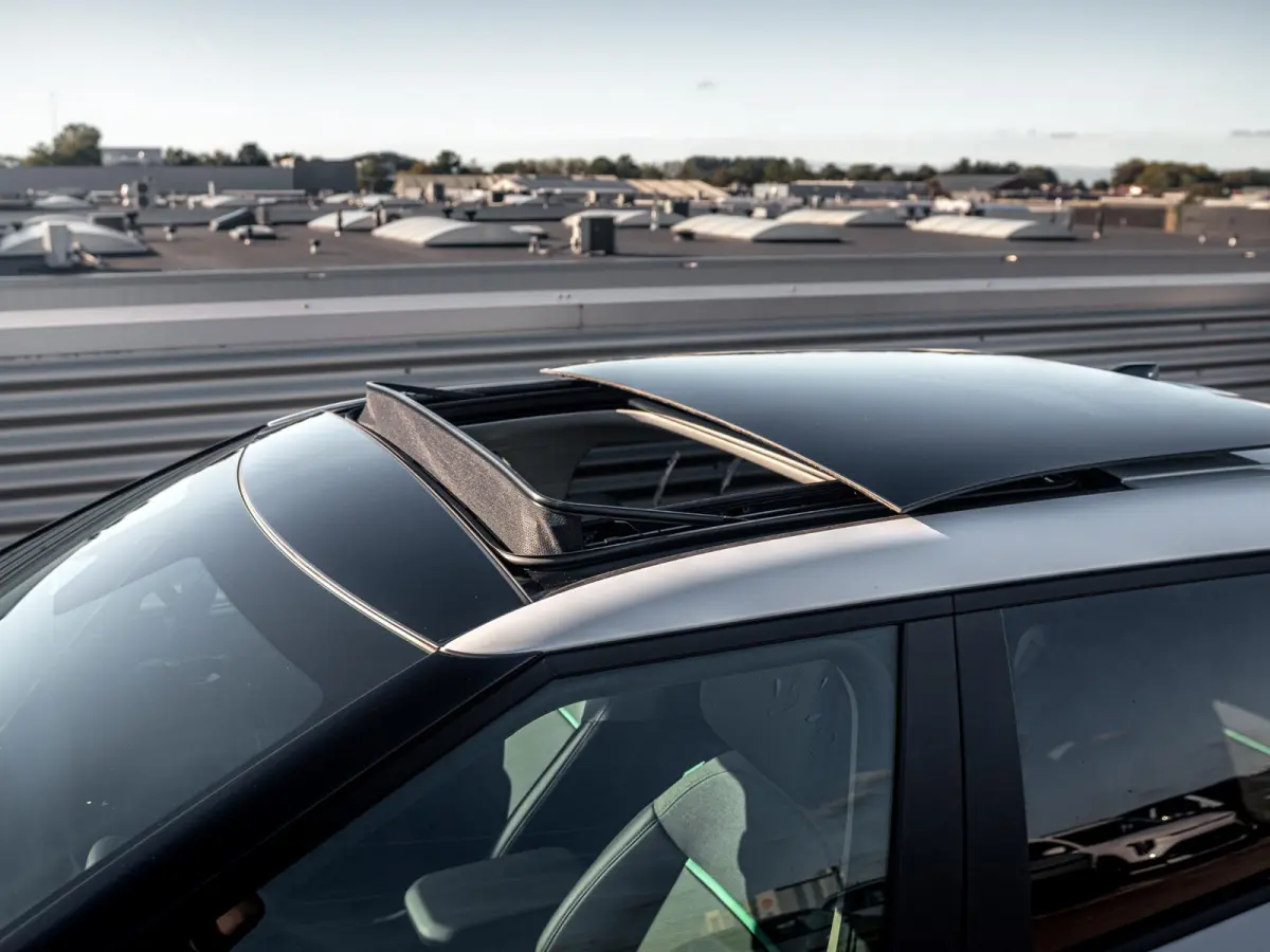 Plus Advanced 58.3 kWh | DIRECT LEVERBAAR | Panodak | Navi. | Clima. | Adapt. Cruise. | Stoel&Stuur Verwarming | Dodehoekassistentie | Harman Kardon