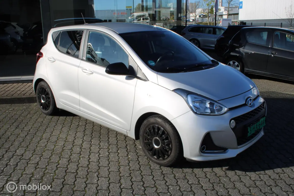 1.0i Comfort 5p./Navi/Tel/Pdc/Stuurverwarming/