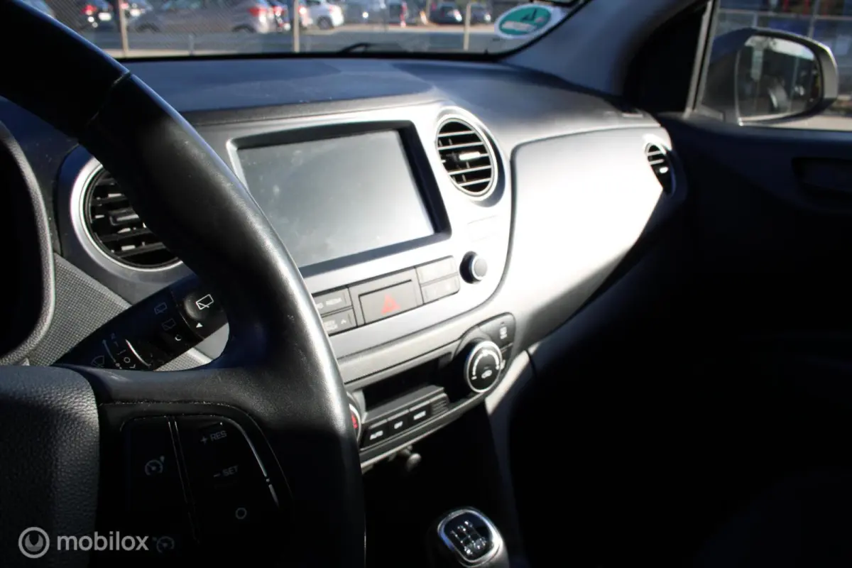 1.0i Comfort 5p./Navi/Tel/Pdc/Stuurverwarming/