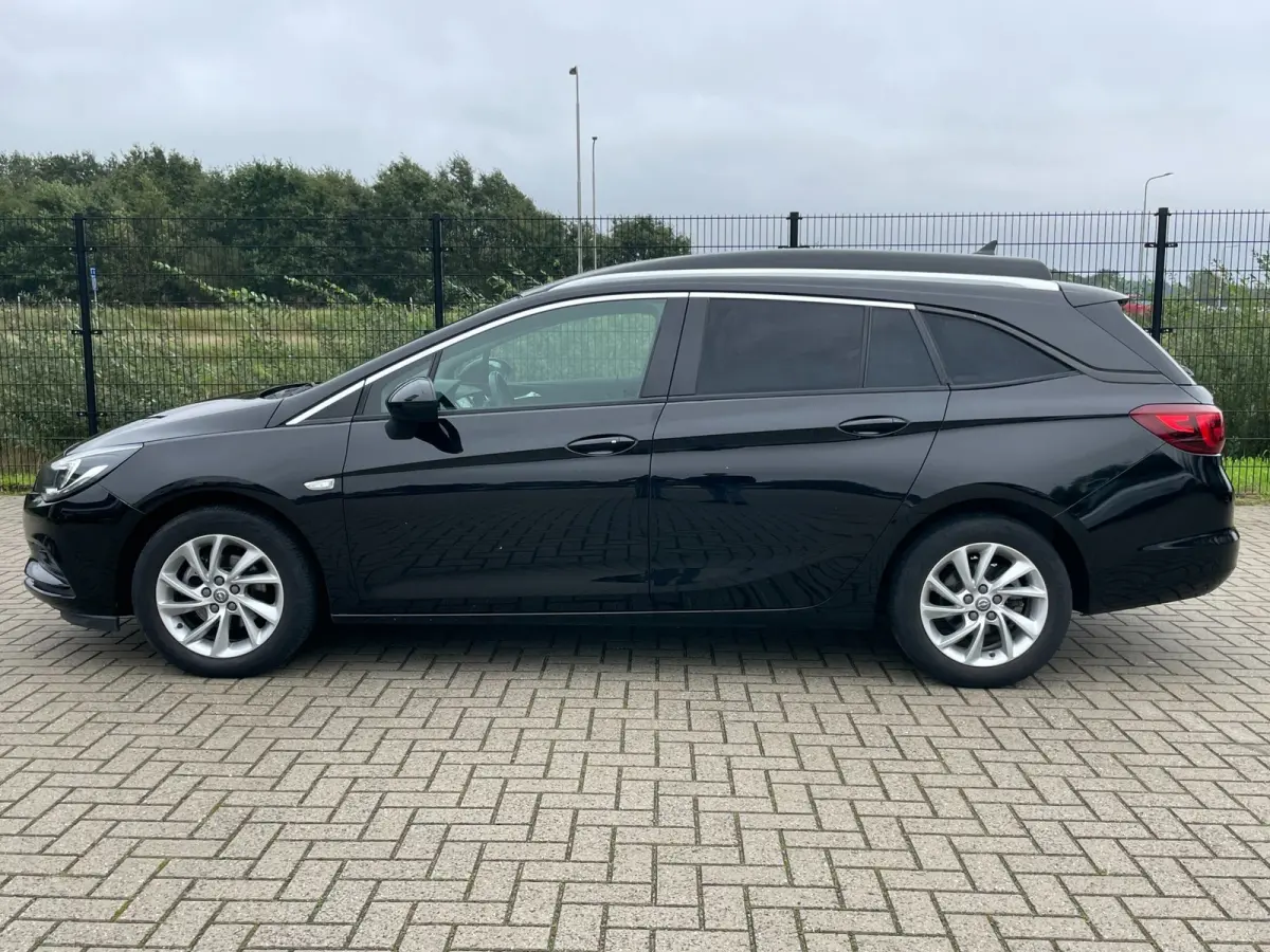 TOURER+ | Grijs Kenteken | Carplay | PDC | Trekhaak | 1ste eigenaar |