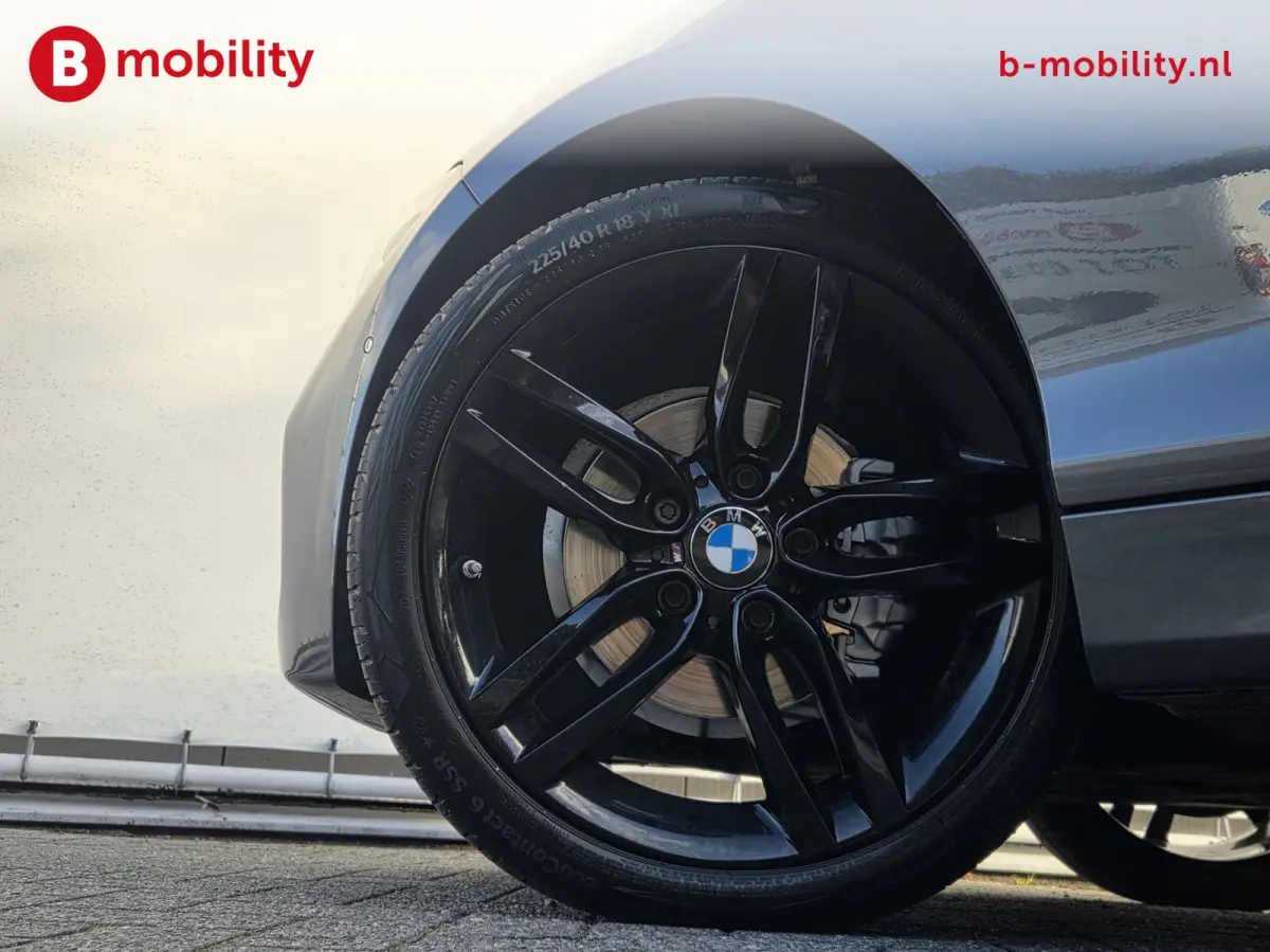 118i High Executive M-Sport Schuif/Kanteldak NL Auto! | Achteruitrijcamera | DAB | Hifi | Apple CarPlay | Leer