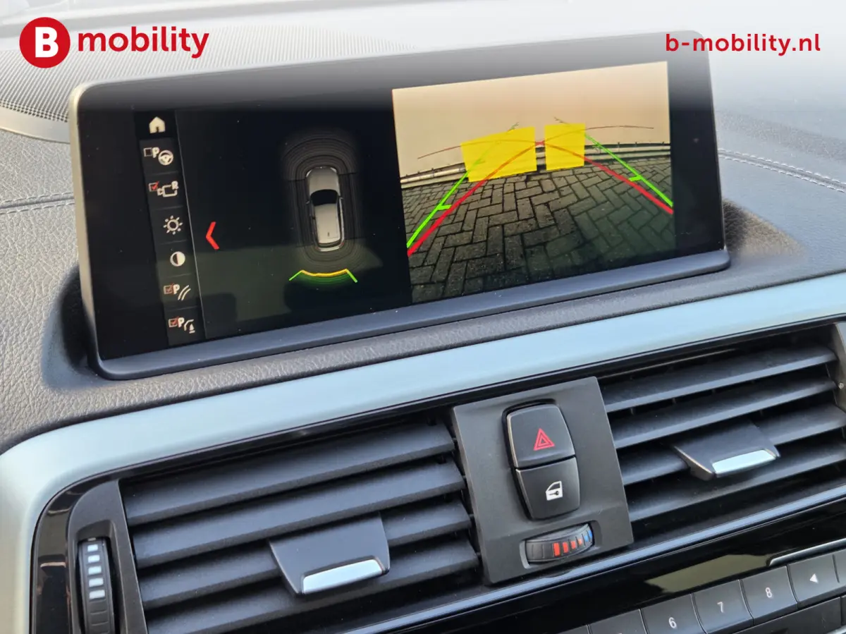 118i High Executive M-Sport Schuif/Kanteldak NL Auto! | Achteruitrijcamera | DAB | Hifi | Apple CarPlay | Leer