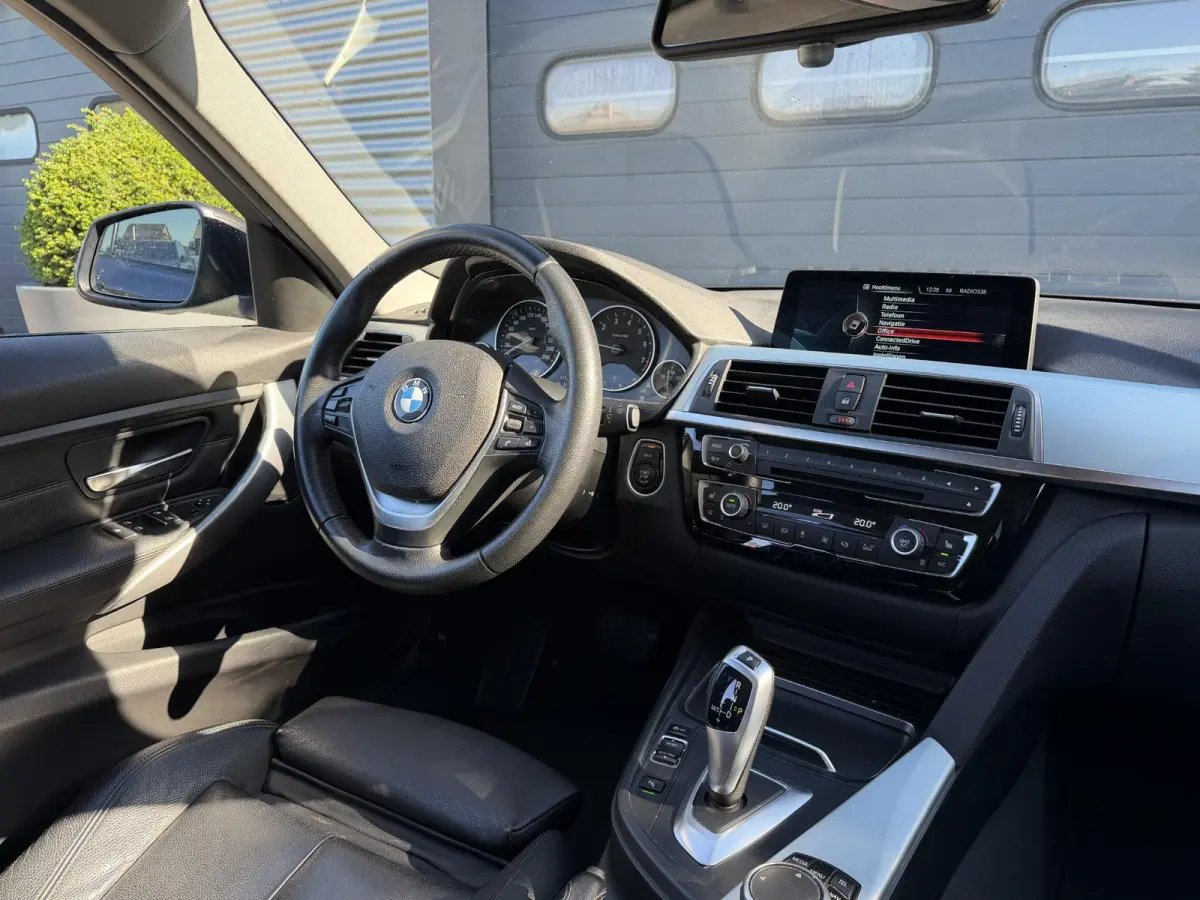 320i Centennial High Executive | Navigatie | Lederen Bekleding | Climate Control | Elektrische Achterklep |