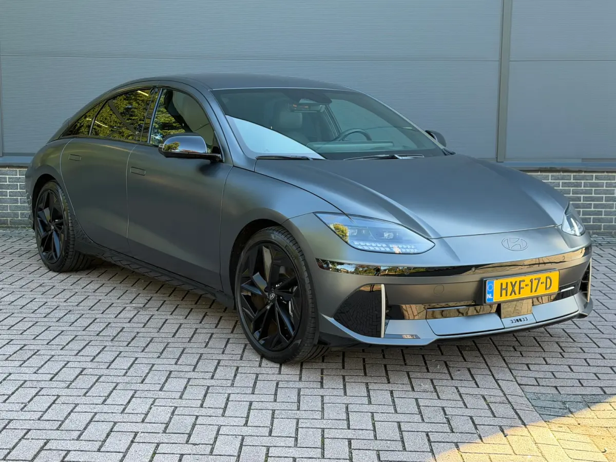 Business 77.4 kWh | Orgineel Nederlands | Navigatie | 360 Graden Camera | Stuur & Stoelverwarming | Bose Audio | Apple Carplay & Android Auto |