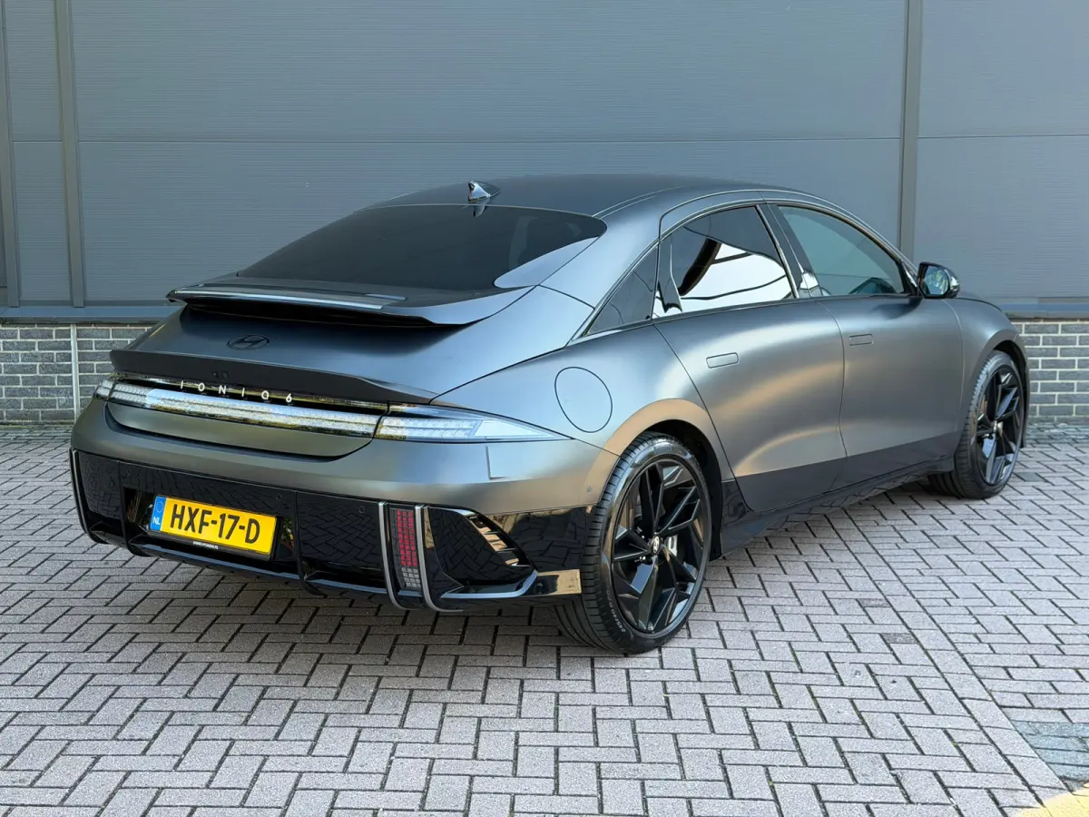Business 77.4 kWh | Orgineel Nederlands | Navigatie | 360 Graden Camera | Stuur & Stoelverwarming | Bose Audio | Apple Carplay & Android Auto |