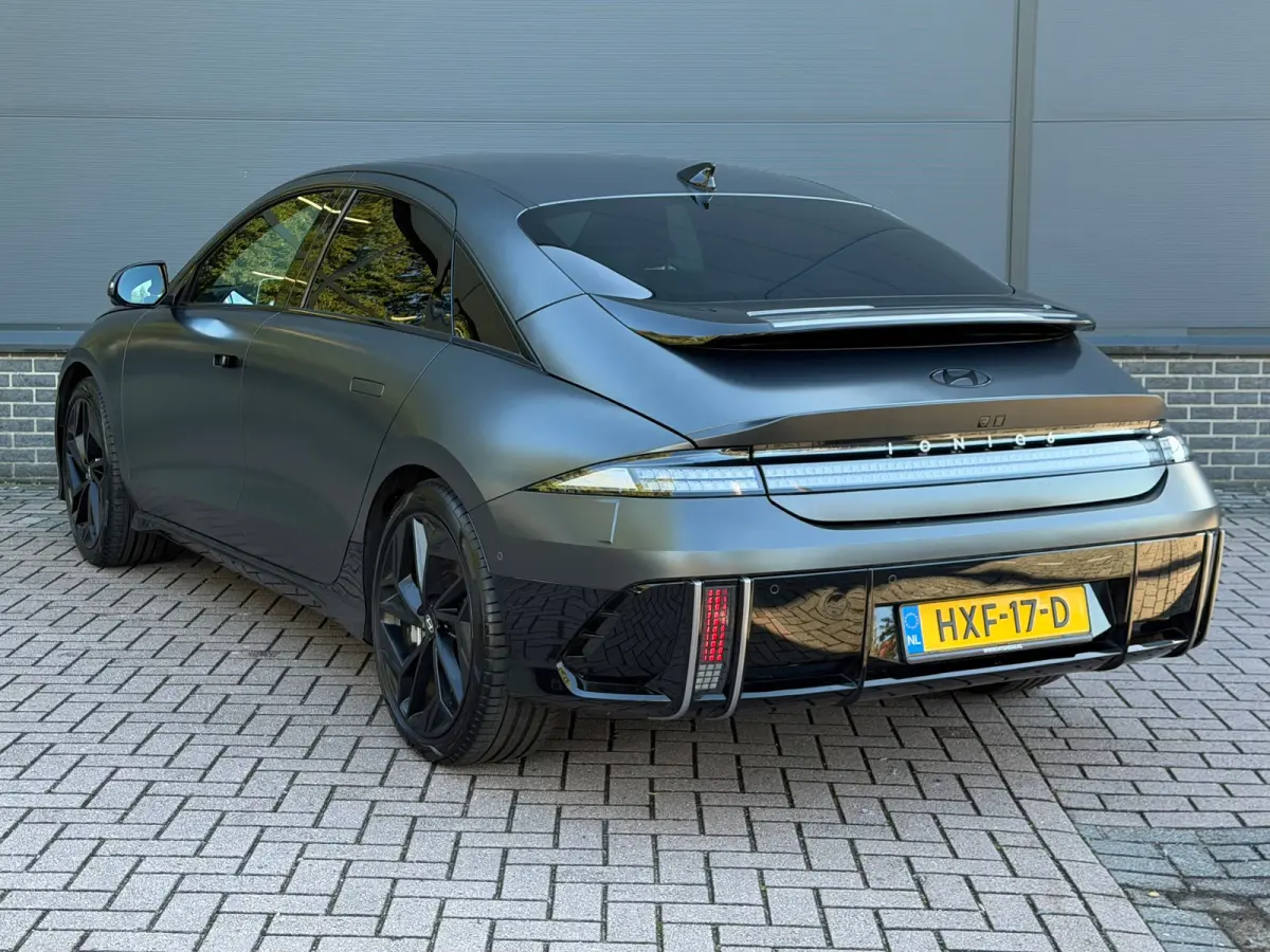 Business 77.4 kWh | Orgineel Nederlands | Navigatie | 360 Graden Camera | Stuur & Stoelverwarming | Bose Audio | Apple Carplay & Android Auto |