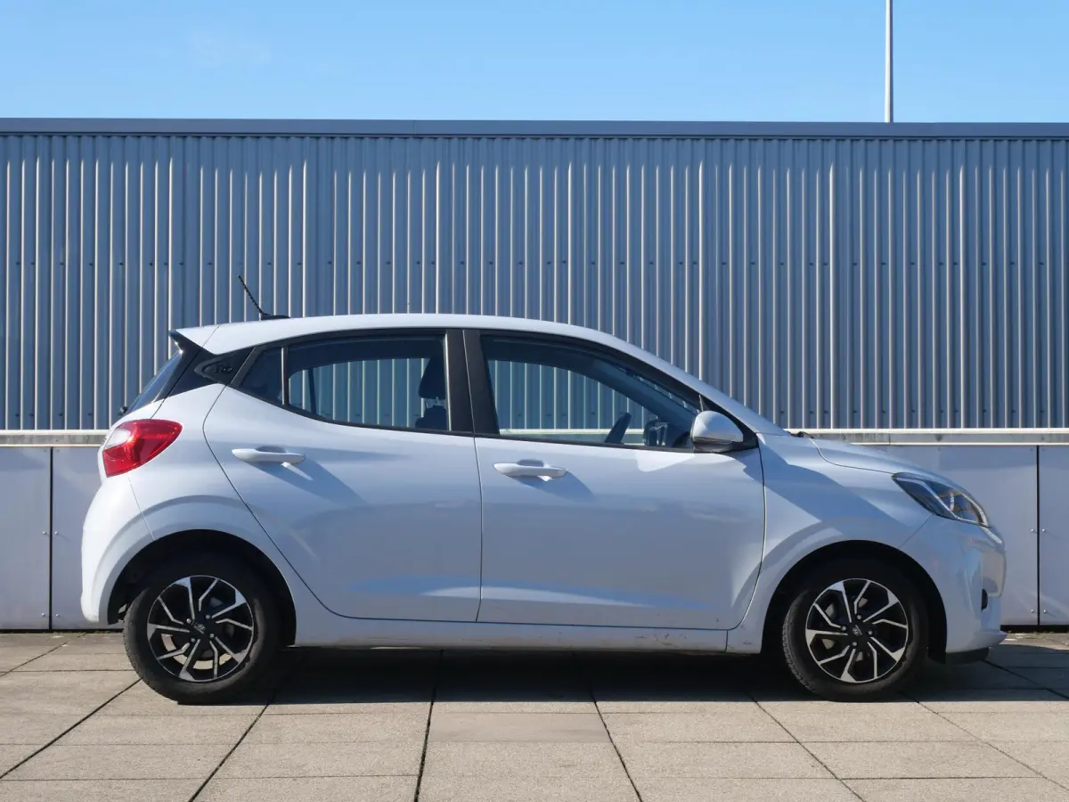 1.0 Premium | All Season Banden | Airco | Navi | Cruise | Clima | Camera |