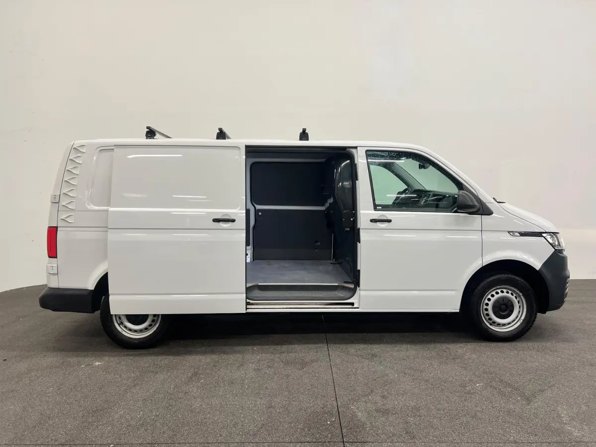 2.0 TDI L2H1 Airco Cruise Control Trekhaak Parkeersensoren 2x schuifdeur Stoelverwarming