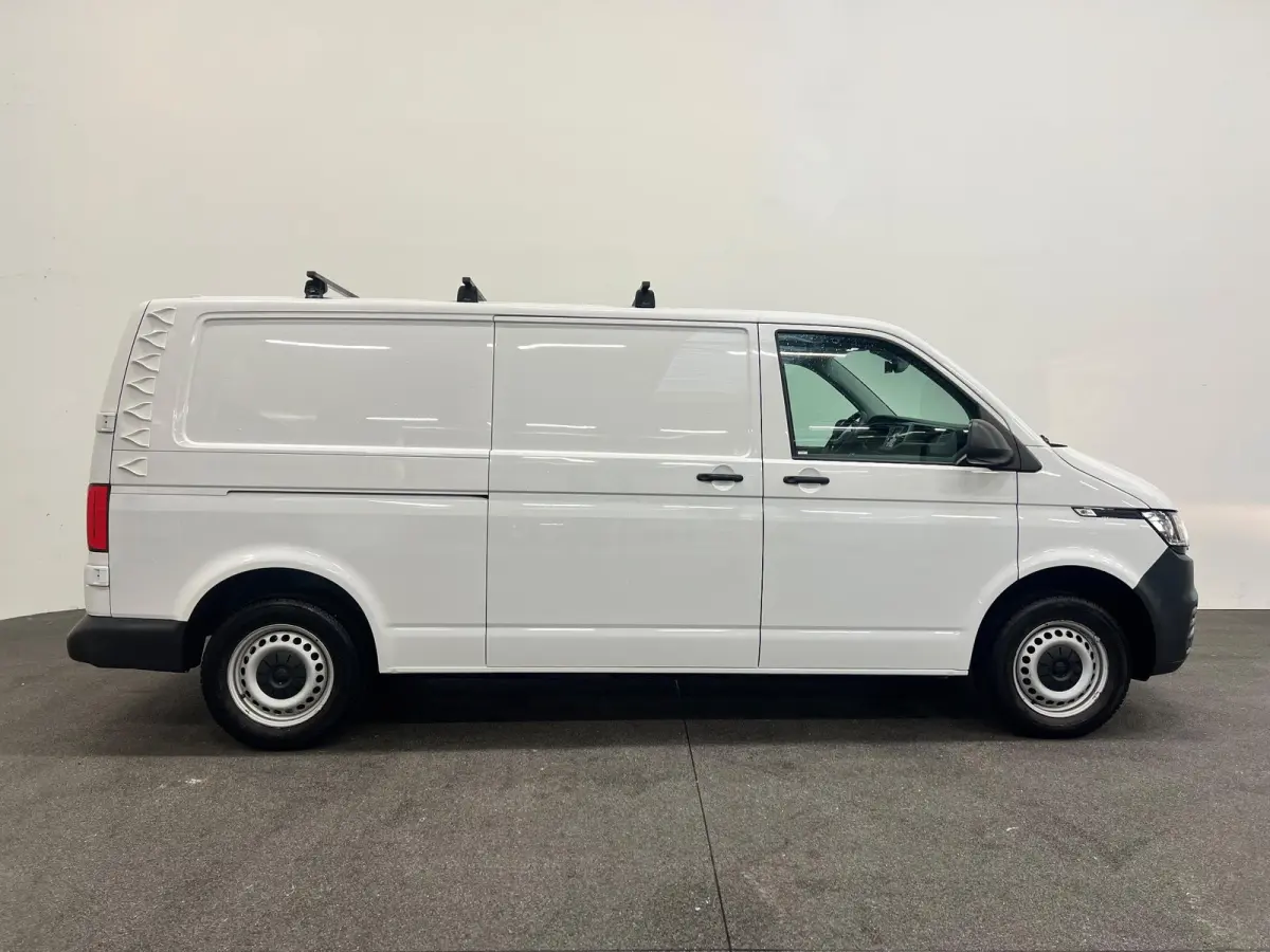 2.0 TDI L2H1 Airco Cruise Control Trekhaak Parkeersensoren 2x schuifdeur Stoelverwarming