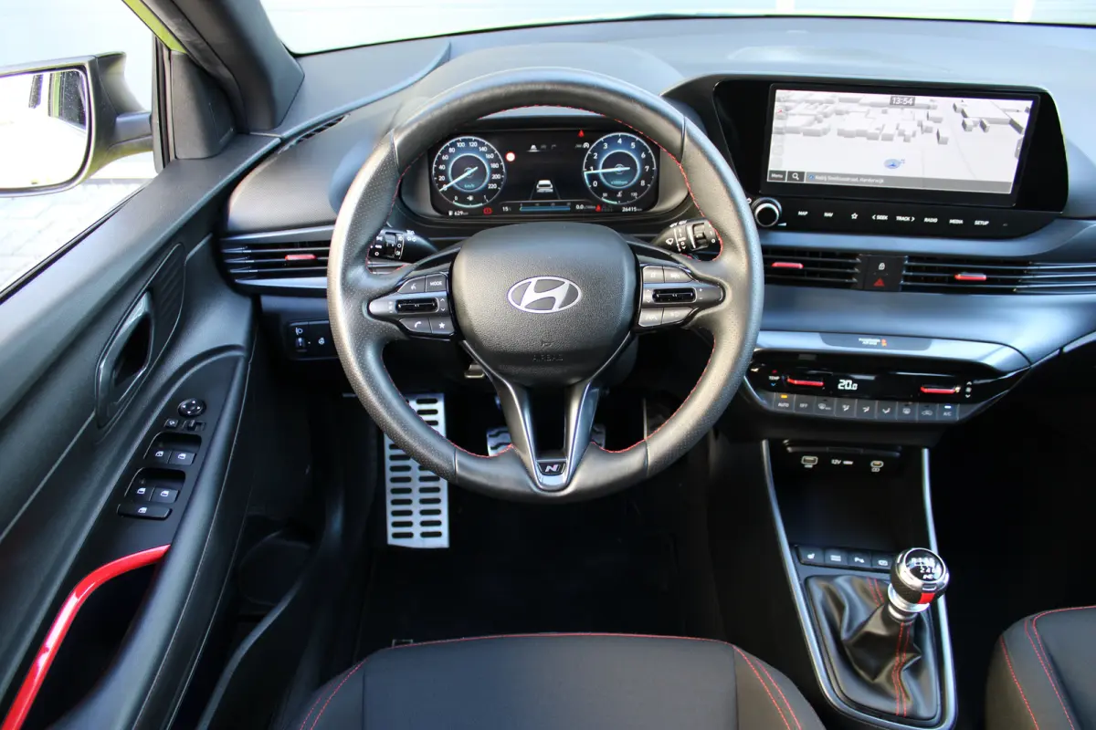 1.0 T-GDI 100pk N-Line | Camera | Carplay | Premium audio | Cruise controle | Navigatie | Lucid Lime | 17'' velgen | Dodehoek detectie | Parkeersensoren