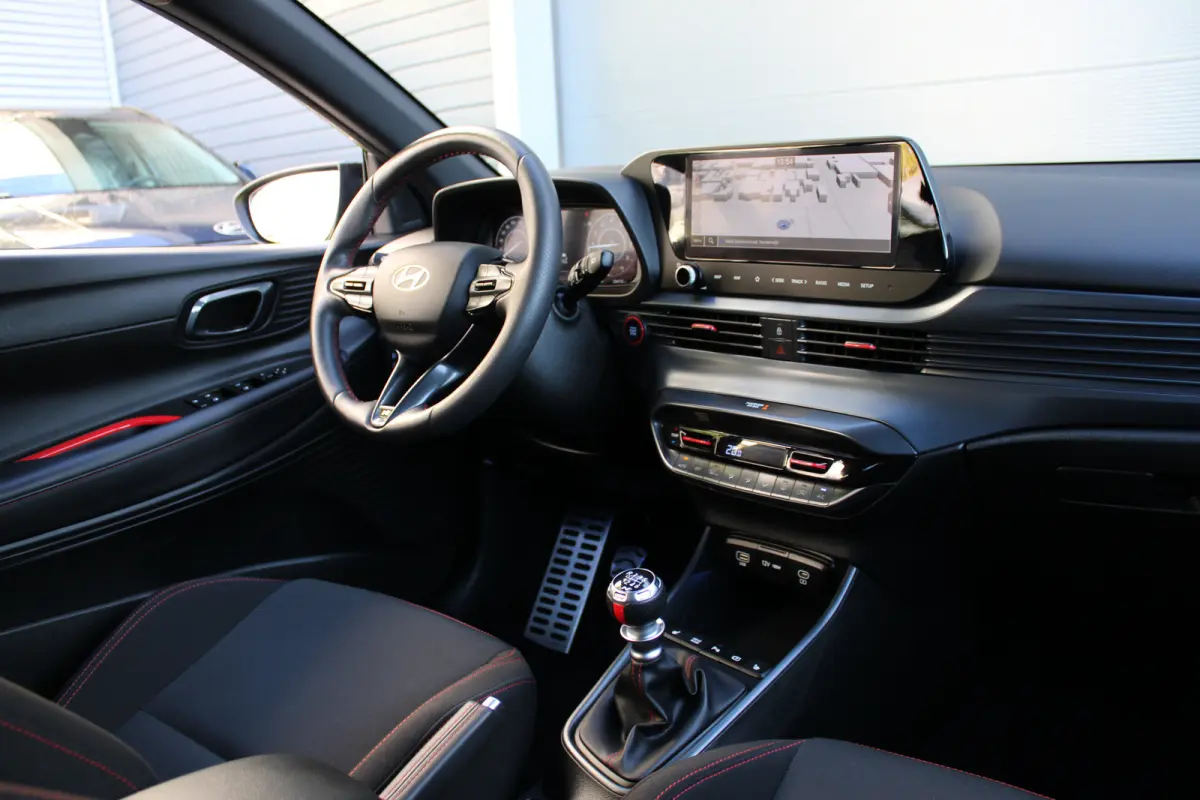 1.0 T-GDI 100pk N-Line | Camera | Carplay | Premium audio | Cruise controle | Navigatie | Lucid Lime | 17'' velgen | Dodehoek detectie | Parkeersensoren