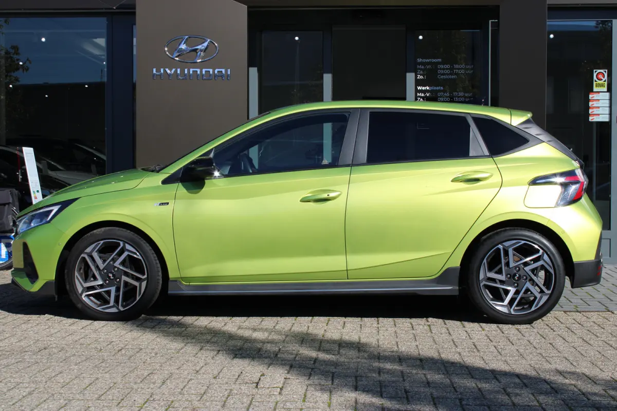 1.0 T-GDI 100pk N-Line | Camera | Carplay | Premium audio | Cruise controle | Navigatie | Lucid Lime | 17'' velgen | Dodehoek detectie | Parkeersensoren