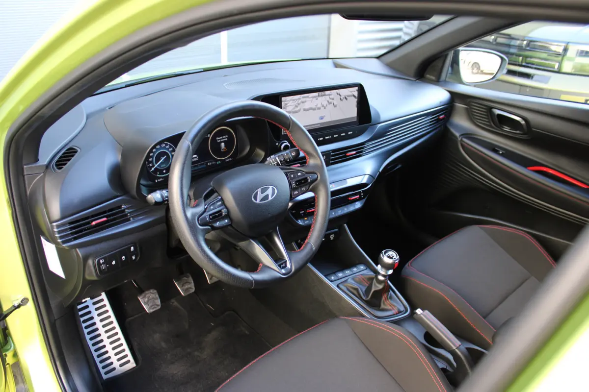 1.0 T-GDI 100pk N-Line | Camera | Carplay | Premium audio | Cruise controle | Navigatie | Lucid Lime | 17'' velgen | Dodehoek detectie | Parkeersensoren