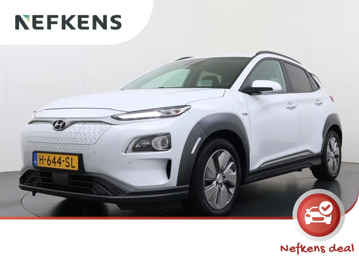 Premium 64kWh | 1ste eigenaar | ACCU 99% | Trekhaak | LEER | Camera | LED lampen | AUTOMAAT