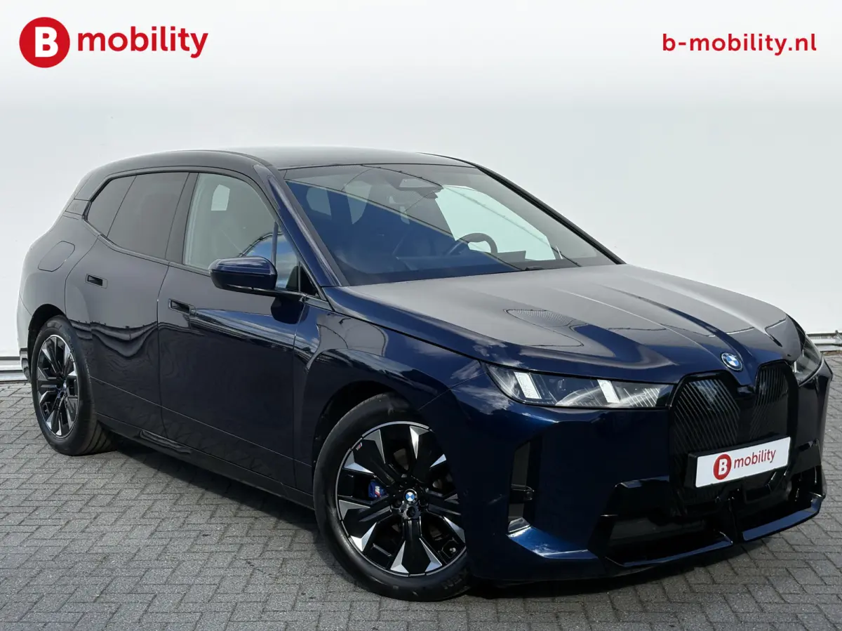 xDrive45 101 kWh M-Sport 'Tansanitblau' Harman Kardon NL Auto! | Adaptive LED | Stuur/Stoelverwarming | DAB | Driving Assist. Plus