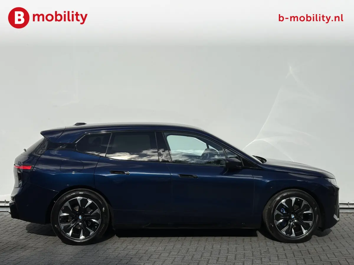 xDrive45 101 kWh M-Sport 'Tansanitblau' Harman Kardon NL Auto! | Adaptive LED | Stuur/Stoelverwarming | DAB | Driving Assist. Plus