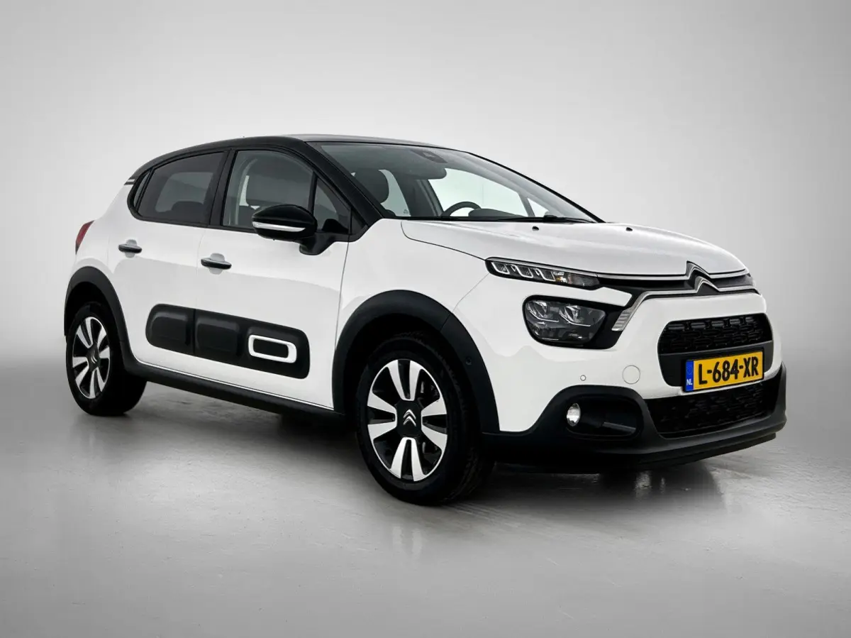 1.2 110pk Business | Navigatie | Camera | Armsteun Voor | Parkeersensoren Voor + Achter | Climate Control | Cruise Control | Getint Glas | 16"LMV | Apple Carplay/Android Auto |