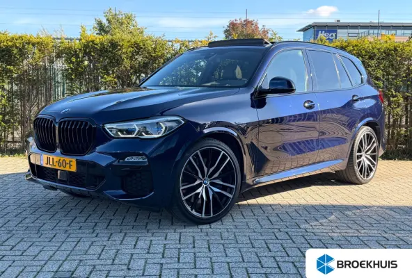 M50i High Executive 530PK | Adapt. Cruise | Softclose | 4-wielsturing | Skylounge | Trekhaak | Harman & Kardon | Head-up | Laser | Memory |