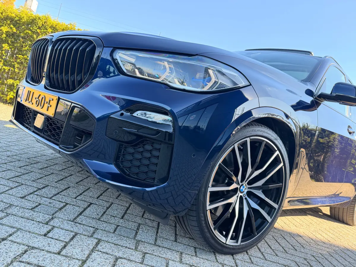 M50i High Executive 530PK | Adapt. Cruise | Softclose | 4-wielsturing | Skylounge | Trekhaak | Harman & Kardon | Head-up | Laser | Memory |