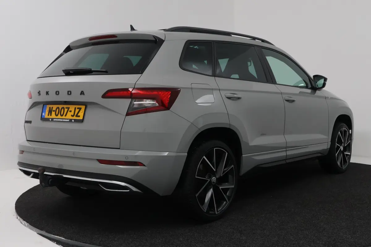 1.5 TSI ACT Sportline Business (PANORAMADAK, TREKHAAK, STOEL/STUUR VERWARMING, CAMERA)