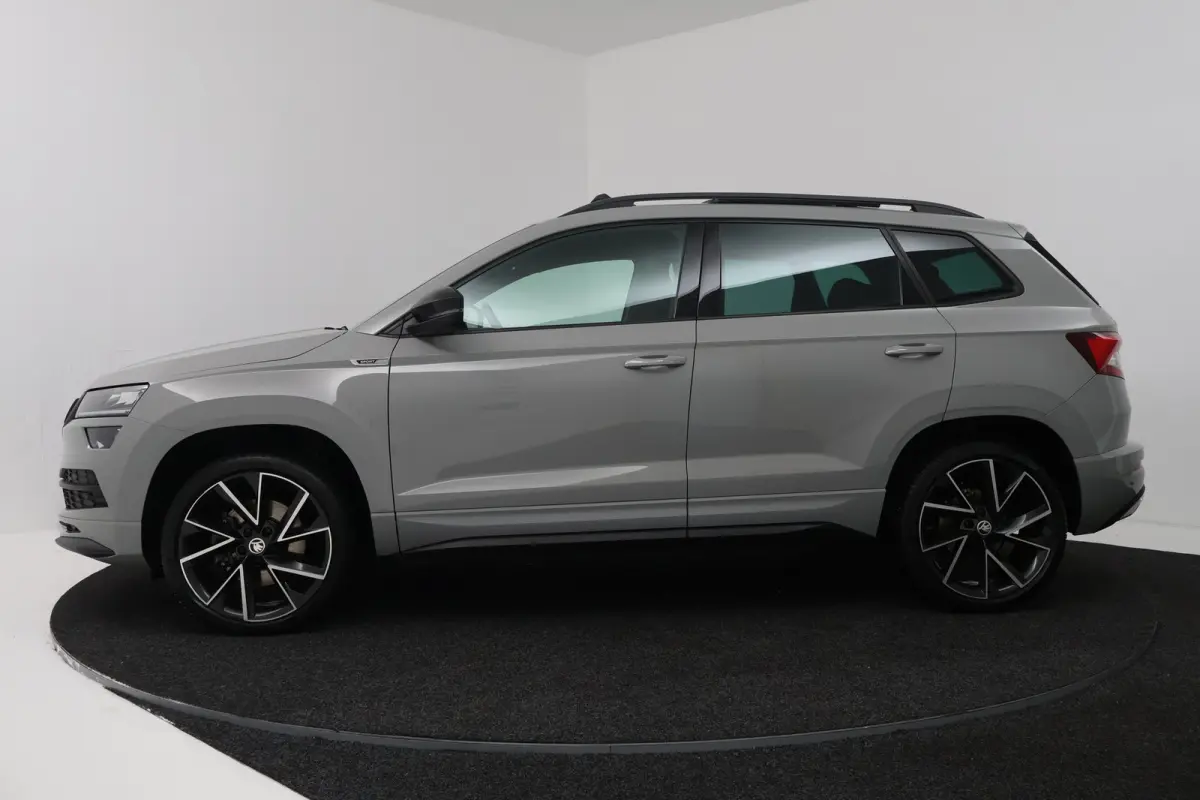 1.5 TSI ACT Sportline Business (PANORAMADAK, TREKHAAK, STOEL/STUUR VERWARMING, CAMERA)