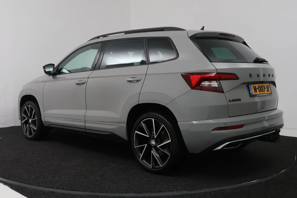 1.5 TSI ACT Sportline Business (PANORAMADAK, TREKHAAK, STOEL/STUUR VERWARMING, CAMERA)