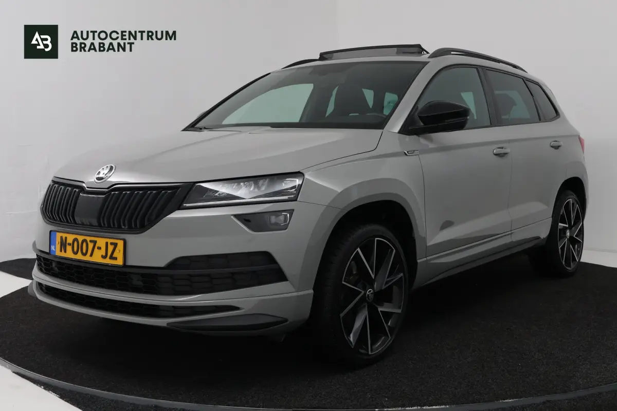 1.5 TSI ACT Sportline Business (PANORAMADAK, TREKHAAK, STOEL/STUUR VERWARMING, CAMERA)