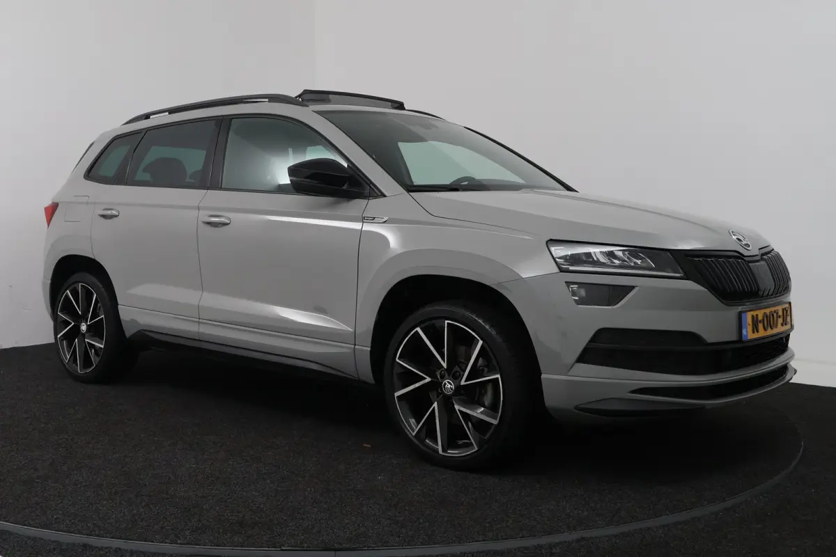1.5 TSI ACT Sportline Business (PANORAMADAK, TREKHAAK, STOEL/STUUR VERWARMING, CAMERA)