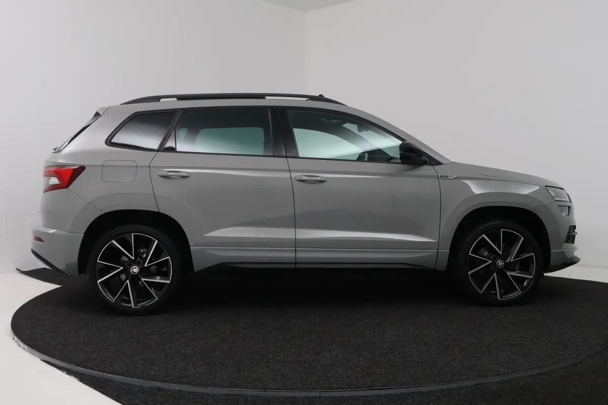 1.5 TSI ACT Sportline Business (PANORAMADAK, TREKHAAK, STOEL/STUUR VERWARMING, CAMERA)