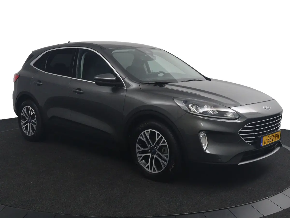 2.5 PHEV Titanium | Dealeronderhouden | Privacy Glass | 18 Inch | Navigatie | CarPlay/Android Auto
