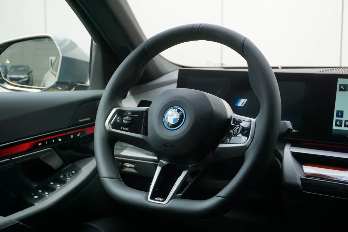 eDrive40 | M Sportpakket Pro | Harman Kardon | Driving Assistant Plus | Comfortstoelen met stoelventilatie