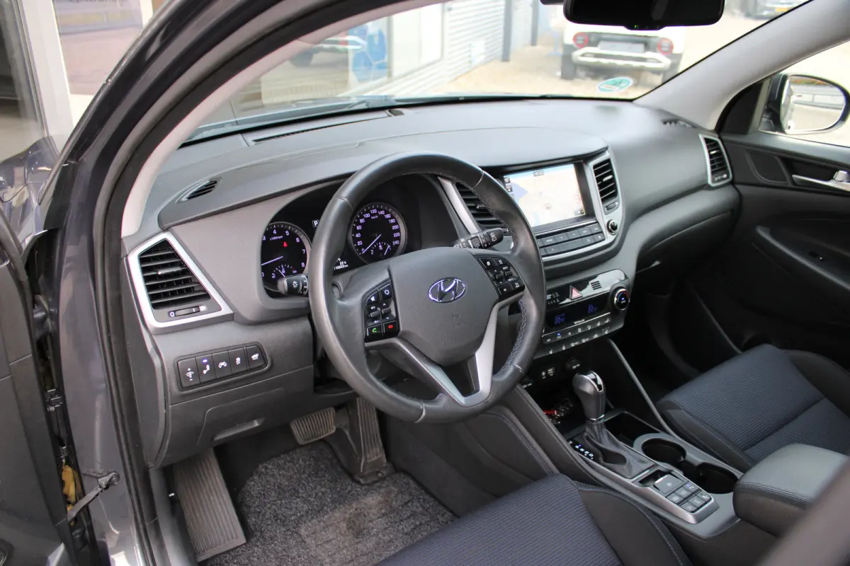 1.6 T-GDi Premium 4WD | Achteruitrijcamera | Keyless entry | Trekhaak
