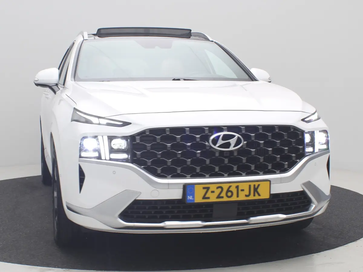 PHEV Premium Sky SOH 100% | Achterbank verwarmd | Achteruitrijcamera 360 graden | Airco (automatisch)