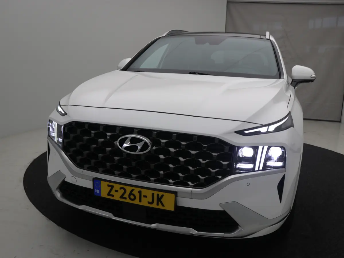 PHEV Premium Sky SOH 100% | Achterbank verwarmd | Achteruitrijcamera 360 graden | Airco (automatisch)