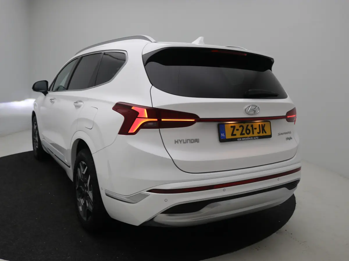 PHEV Premium Sky SOH 100% | Achterbank verwarmd | Achteruitrijcamera 360 graden | Airco (automatisch)