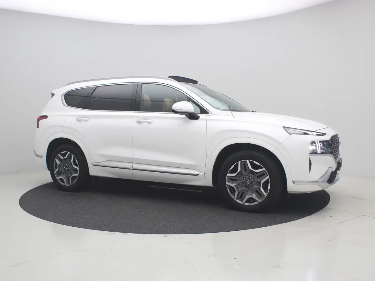 PHEV Premium Sky SOH 100% | Achterbank verwarmd | Achteruitrijcamera 360 graden | Airco (automatisch)