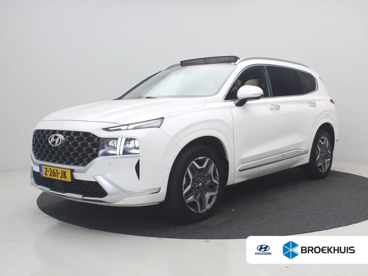 PHEV Premium Sky SOH 100% | Achterbank verwarmd | Achteruitrijcamera 360 graden | Airco (automatisch)