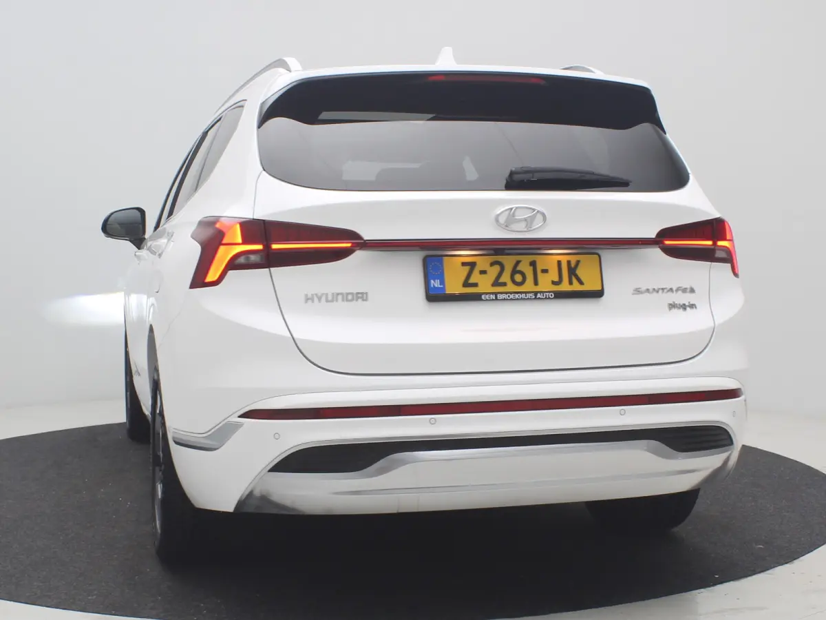 PHEV Premium Sky SOH 100% | Achterbank verwarmd | Achteruitrijcamera 360 graden | Airco (automatisch)