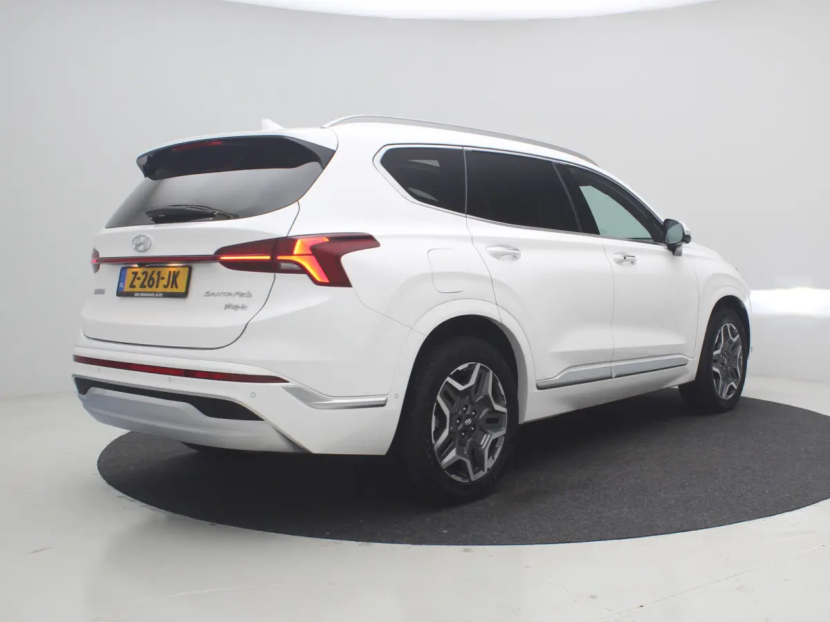 PHEV Premium Sky SOH 100% | Achterbank verwarmd | Achteruitrijcamera 360 graden | Airco (automatisch)